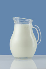 Glass jug with fresh milk
