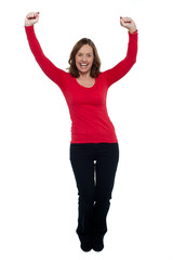 Obraz premium Jubilant lady celebrating her success