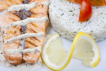 fish with rice and sauce