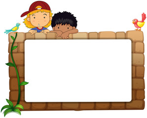 Kids with white board on wall