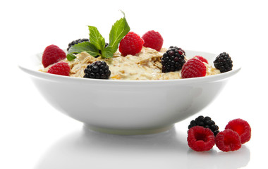 tasty oatmeal with berries, isolated on white
