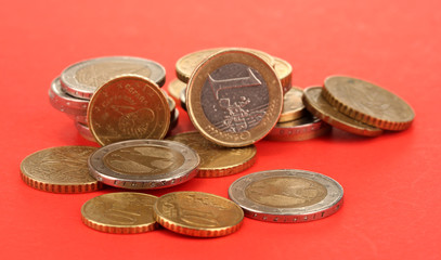 euro coins on color background