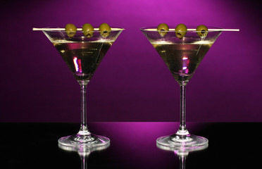 Martini glasses on dark background