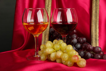 composition of frame,wine and grapes on bright background