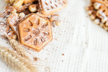 wafers with powdered sugar and wheat ears