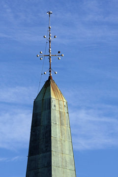 detail of a copper bell shaped Obelisk