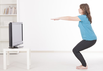 Woman exercisng at home