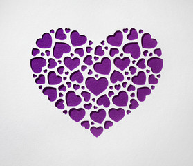 Valentine day heart made of small hearts on paper card