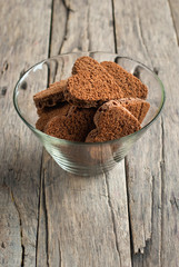 Chocolate Cookies in the Shape of Heart on Wooden Background