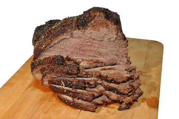 Roast Beef On Wooden Cutting Board