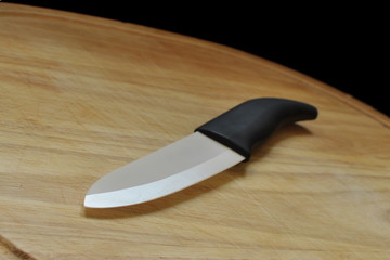 Ceramic knife on a cutting board