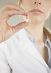 medical woman with pill