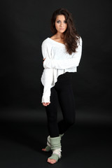 young modern dancer  posing, isolated on black