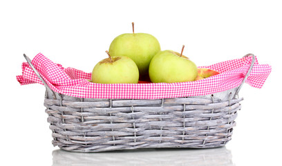 Ripe apples in basket isolated on white