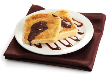White bread toast with chocolate on plate, isolated on white