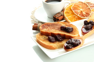 White bread toast with jam and cup of coffee, isolated on white