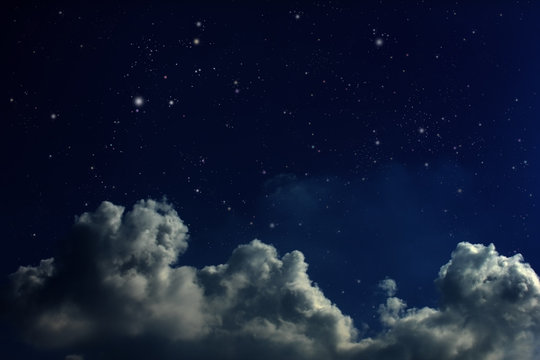 Cloudy Night Sky With Stars