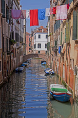 Venice, canal, water reflection and laundry hanging