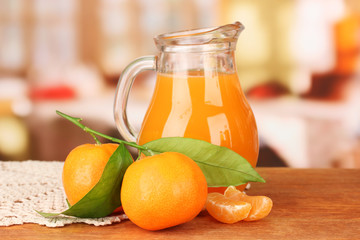 Full jug of tangerine juice,