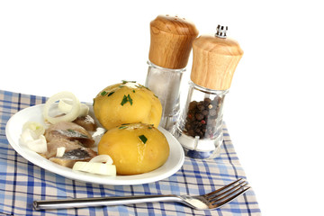 Dish of herring and potatoes on plate isolated on white