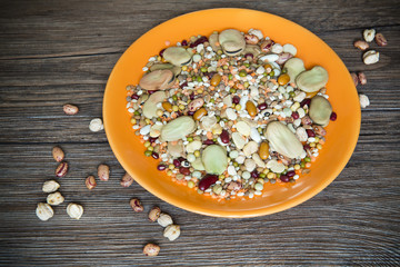 Mixed vegetables on a wooden background