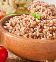 Buckwheat porridge in a wooden bowl 