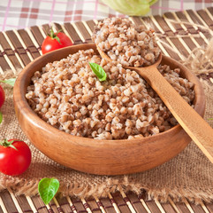 Buckwheat porridge in a wooden bowl 