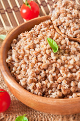 Buckwheat porridge in a wooden bowl 