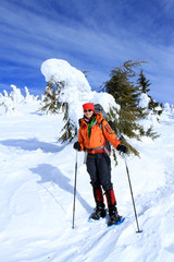 Winter hiking in snowshoes.