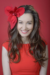 Fototapeta premium Romantic woman, wearing flower and cute red dress