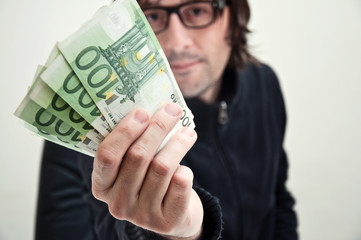 Man paying in euros