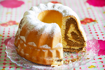 Nut roll cut with walnut filling, dusted with sugar