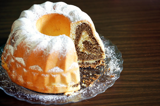 Walnut roll traditional holiday cake with dusting sugar