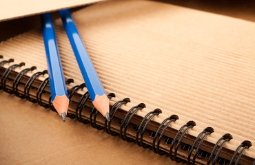 Notepad, pencils and paper folder