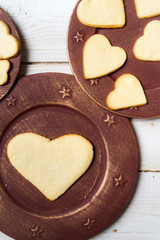 Heart-shaped cookies arranged on a plate no. 5