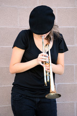Female trumpet player.