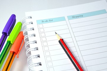 pencil, pen and notebook