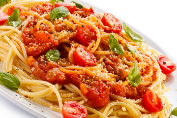 Pasta with meat, tomato sauce, parmesan and vegetables