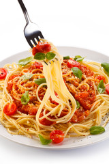 Pasta with meat, tomato sauce, parmesan and vegetables