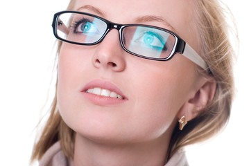 Close-up portrait of a girl with glasses facing upward