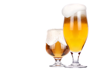 Frosty glass of light beer set isolated