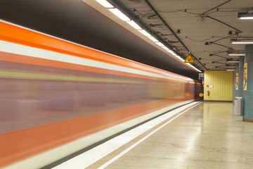 metro station with train in Motion