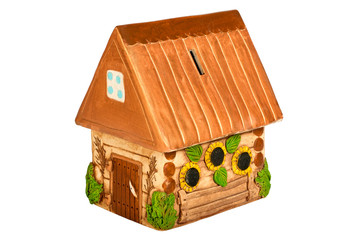 Obraz na płótnie Canvas Miniature model country home (piggy bank)