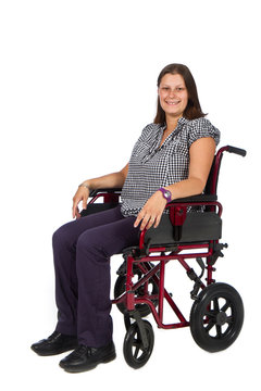 Smiling female patient in a wheelchair