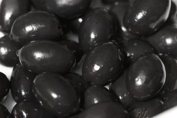 Fresh raw olives with shiny oil