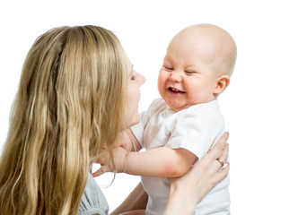 loving mother supporting her child on white background