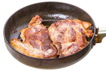 Roast pork in a frying pan