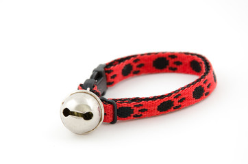 red collar with bell isolated over white background