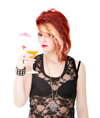 punk woman drinks a cocktail