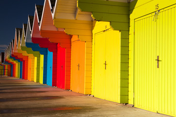 Detail of beach huts at sunrise